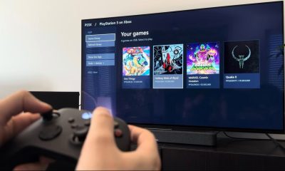 玩家手持 Xbox 手柄，电视屏幕显示 PS5X 移植版的游戏库界面