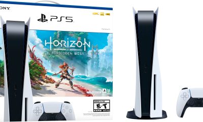 PS5《地平线》同捆版包装盒靠在车身旁，零售实体版包装实拍