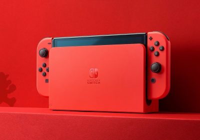 任天堂Switch OLED主机插在底座上的官方产品图