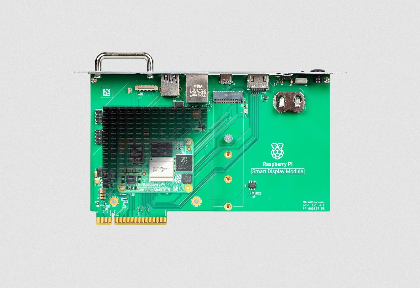树莓派 Smart Display Module 适配板俯视图,绿色电路板与内部连接器